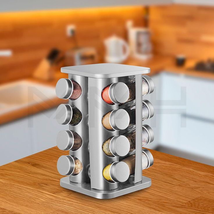 16 Pieces of SPICES ROTATING JARS _STEEL BODY  GLASS BOTTLES