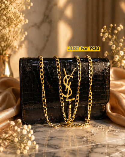 Luxurious YSL handbag with a crocodile-embossed finish